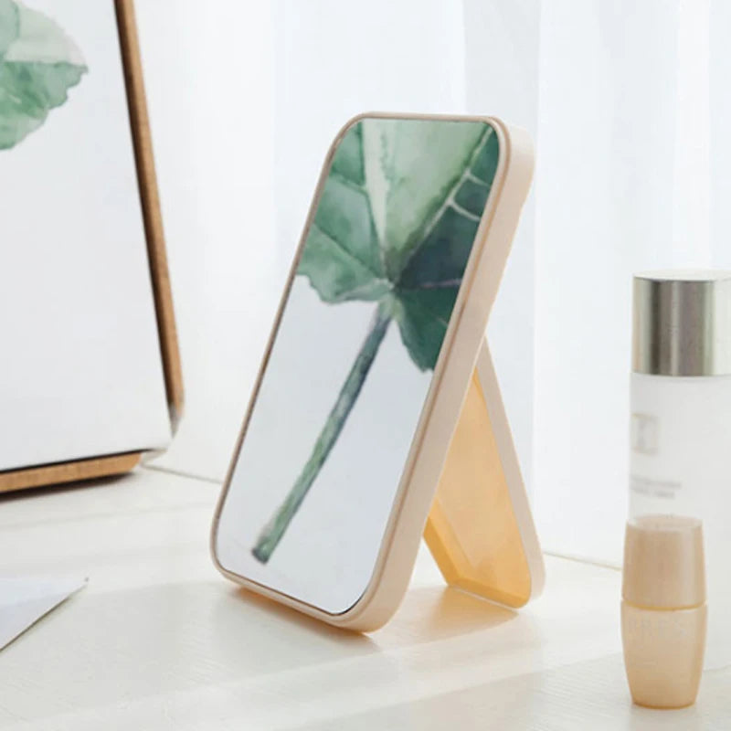 Elegant Portable Folding Cosmetic Mirror for Stylish Bedroom Decor